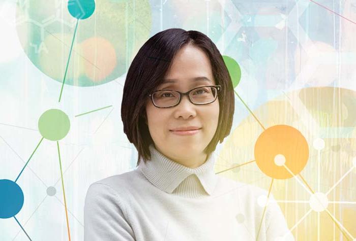 Photo-illustration of Jier Huang with multiple molecular structures around her